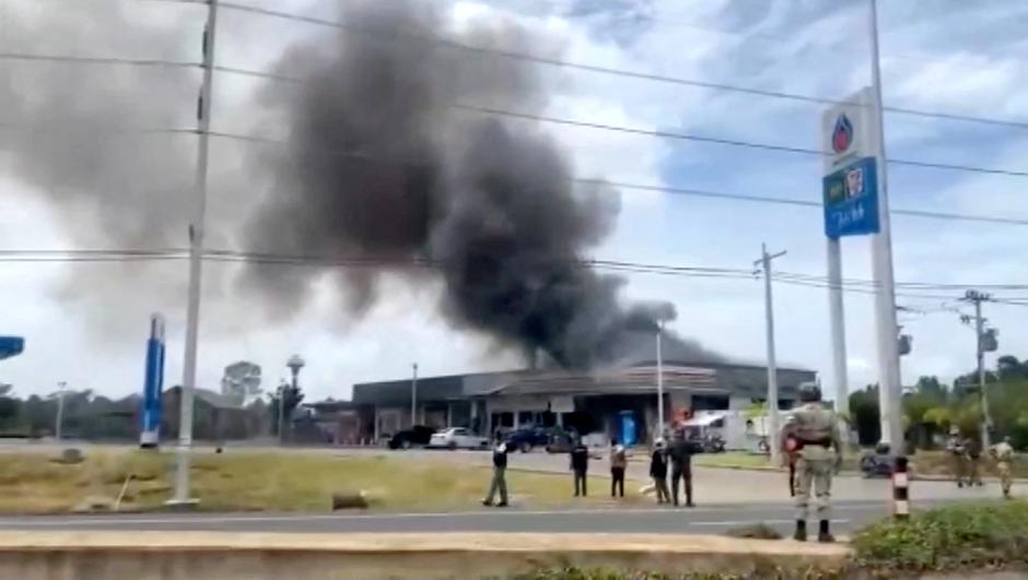 Smoke rises from a convenience store at a gas station, amid the clashes between Thailand and Cambodia, in Kantharalak district | Author: TPBS