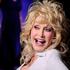FILE PHOTO: Actress and singer Dolly Parton arrives at the Hollywood premiere of "Joyful Noise" in Los Angeles, California