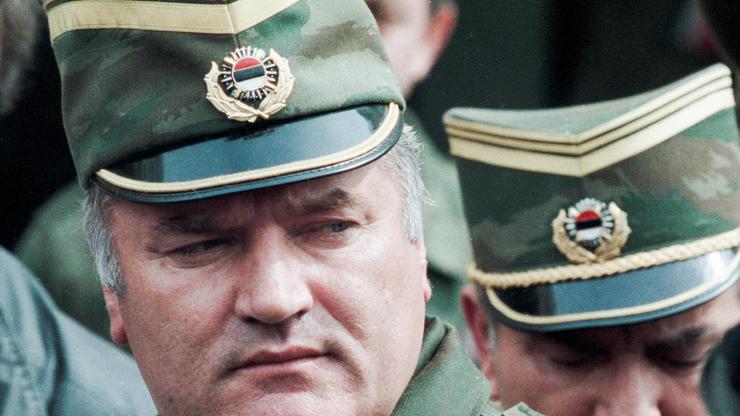 FILE PHOTO: Bosnian Serb General Ratko Mladic leaves a meeting at the airport in Sarajevo