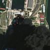 A satellite image shows fire and smoke rising from oil tanks, after what Ukrainian President Volodymyr Zelenskiy said was an attack on an oil depot in the city of Kerch