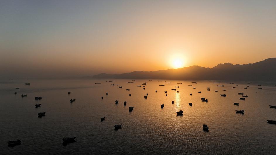 FILE PHOTO: A drone view of vessles anchored in the Strait of Hormuz as seen from Musandam