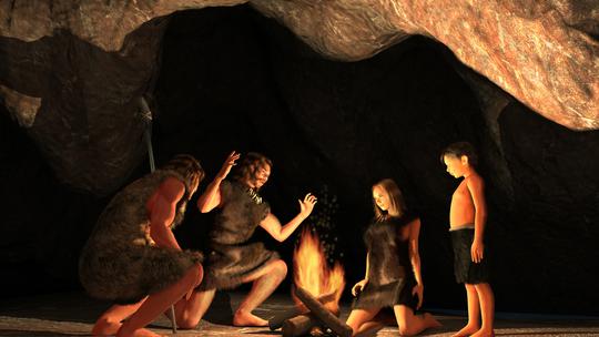 Neandertalci okupljeni oko vatre u špilji