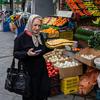 Tehranis shopping during bomb raids