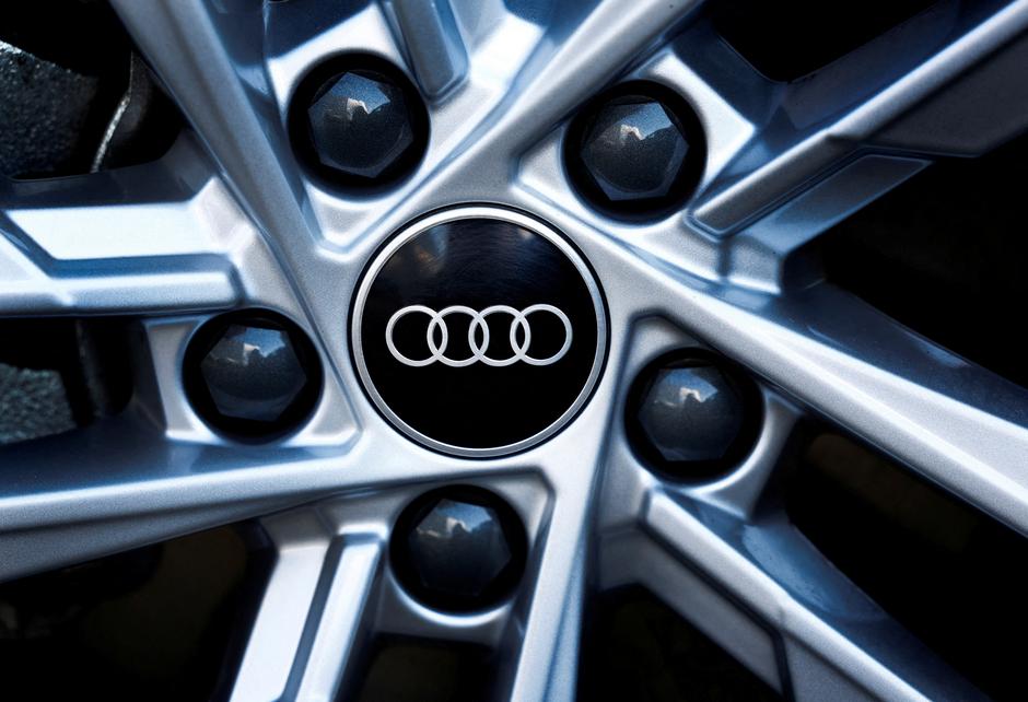FILE PHOTO: A logo of Audi is seen outside a car dealer in Nijmegen | Author: Piroschka Van De Wouw