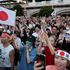 FILE PHOTO: Supporters of Japan's Sanseito party leader react during the party’s rally in Tokyo