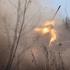 Ukrainian servicemen fire a BM-21 Grad multiple-launch rocket system toward Russian troops near the city of Pokrovsk