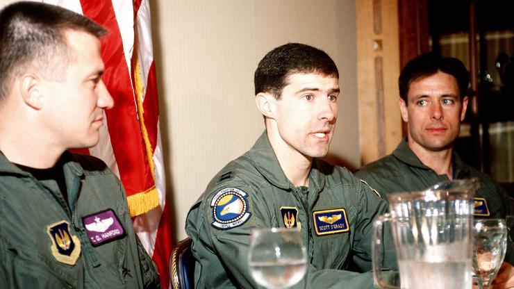 US Air Force Captains T.O. Hanford (left), Scott F. O'Grady (center), and Bob Wright (right) speak at a press conference.  Capt. O'Grady's F-16 Fighting Falcon was shot down over Bosnia on June 2, 1995, while he was flying in support of Operation Deny Fli