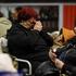 People take shelter inside a metro station during a Russian air attack on Kyiv