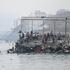 Migrants cross the border swimming through the sea, in Ceuta