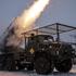Ukrainian servicemen fire a Grad MLRS towards Russian troops near the frontline town of Chasiv Yar