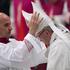 FILE PHOTO: Pope Francis has his mitre removed as he arrives to lead a mass to mark the World Day of Peace in Saint Peter's Basilica at the Vatican