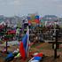 People visit a cemetery in Donetsk