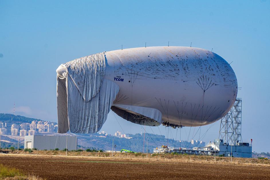 GIVAT AVNI, ISRAEL - NOVEMBER 3, 2021: Israel's deffence force launches a massive reconnaissance surveillance balloon to detect aerial threats at long