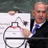 FILE PHOTO: Israel's Prime Minister Netanyahu points to red line he drew on graphic of bomb used to represent Iran's nuclear program, in New York