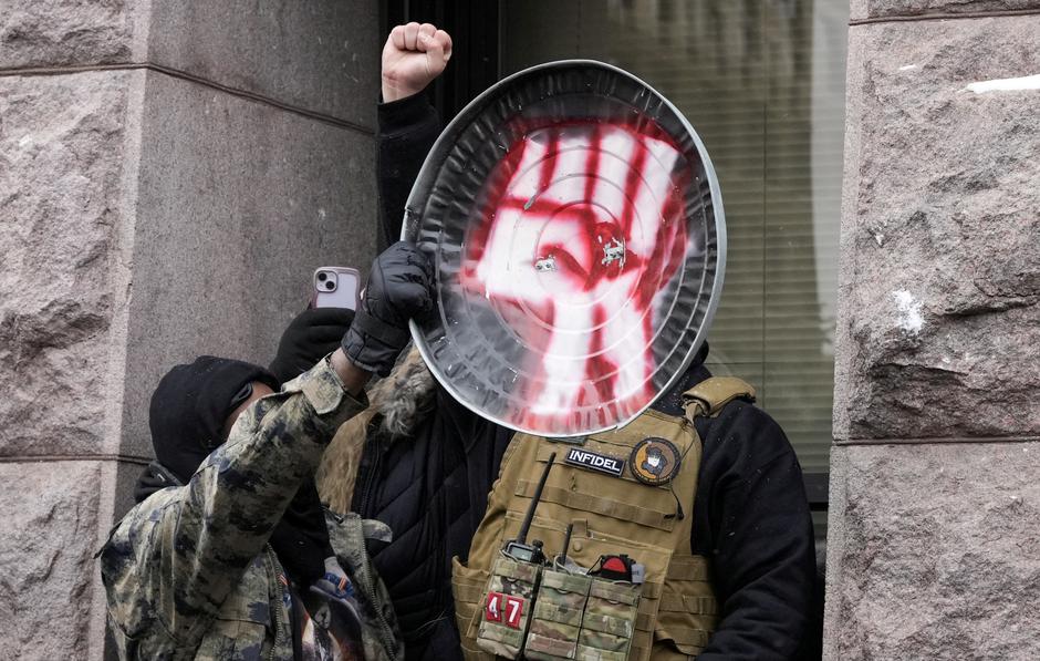 People attend the "March Against Minnesota Fraud" in Minneapolis | Author: Tim Evans