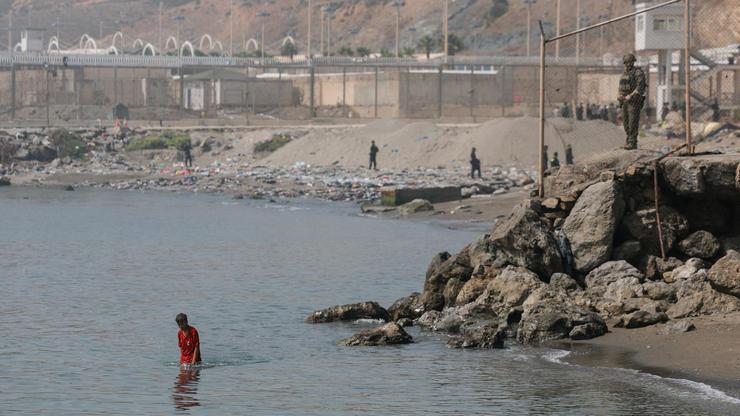 Mass crossings of migrants on foot and by sea from Morocco into Spanish territory, in Ceuta