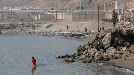 Mass crossings of migrants on foot and by sea from Morocco into Spanish territory, in Ceuta