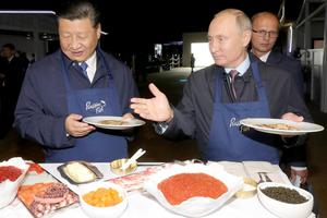Presidents of Russia and China visit Far East Street exhibition