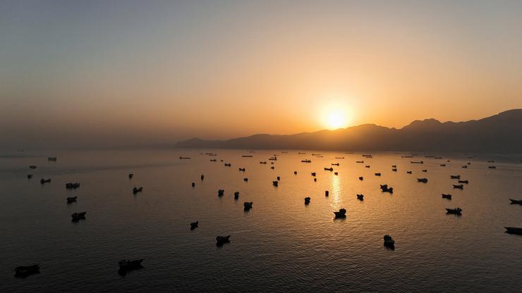 FILE PHOTO: A drone view of vessles anchored in the Strait of Hormuz as seen from Musandam