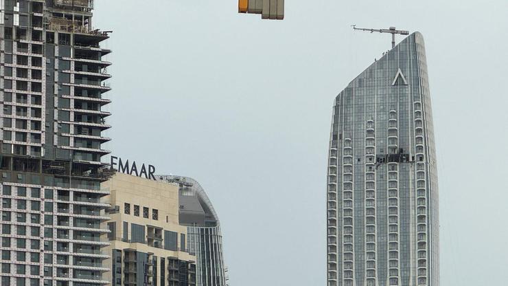 A damaged building in the vicinity of Dubai Creek Harbour after a drone fell on it, amid the U.S.-Israeli conflict with Iran, in Dubai