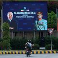 Billboard displaying portraits of Pakistan's Chief of Army Staff Field Marshal Asim Munir and Prime Minister Shehbaz Sharif, following a deal between the U.S. and Iran, in Islamabad