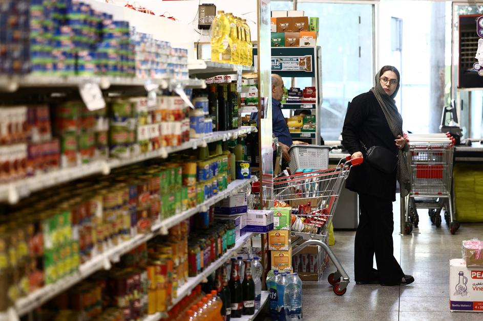 An Iranian woman shops in a store in Tehran