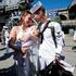 The US Navy Nimitz-class aircraft carrier USS Abraham Lincoln returns home following an extended deployment in the Middle East at Naval Base Coronado in San Diego