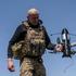 Ukrainian serviceman prepares a P1-Sun FPV interceptor drone for a launch near the frontline in Donetsk region