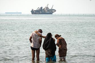 Iranian vessels hit in U.S. attack anchored near Strait of Hormuz..