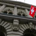 FILE PHOTO: A Swiss flag hangs at the Swiss Parliament building (Bundeshaus) in Bern