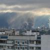 FILE PHOTO: Thick plumes of smoke with flames rise from an oil refinery in Moscow