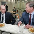 FILE PHOTO: Russian President Putin and Defence Minister Ivanov have coffee in Moscow