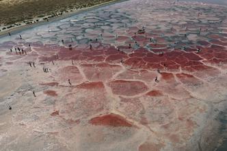 ALXA, CHINA - AUGUST 22: An aerial view shows the heart-shaped Wulan Lake surrounded by salt patterns in the Tengger Des