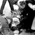 Bloody Sunday Riot In Londonderry. Father Edward Daly Absolves A Dying Man During The Bloody Sunday Massacre In Derry (londonderry) Northern Ireland In January 1972