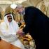FILE PHOTO: Palestinian Prime Minister Ismail Haniyeh greets Qatar's Sheikh Hamad bin Khalifa al-Thani during the Arab summit in Riyadh