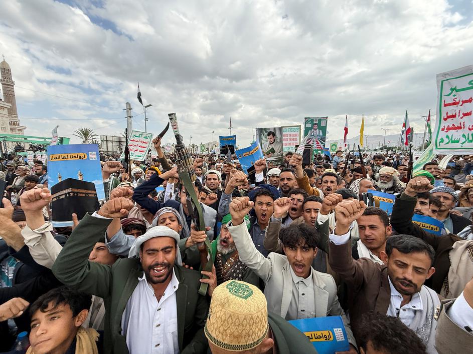Houthi supporters rally to celebrate advances by Houthi forces along the Red Sea coastline, in Sanaa