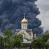 Smoke rises from an oil refinery following a Ukrainian drone attack in Moscow