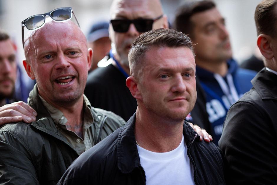 London, UK. 13th Sep, 2025. Tommy Robinson and his security march with the crowd past the Houses of Parliament for the Unite The Kingdom march in the city. A counter-demonstration was also organised by Stand Up To Racism, which saw 16000 police officers d | Author: 