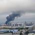Smoke rises following what the authorities say is a Ukrainian drone strike in Moscow