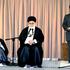 Iran's Supreme Leader Ayatollah Ali Khamenei (C) and former president Mohammad Khatami listen to a s..