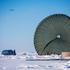 A C-17 Globemaster III from the 249th Airlift Squadron, Alaska Air National Guard, flies over a temporary ice camp in the Arctic Ocean on March 2, 2016, dropping eight pallets of equipment and supplies in support of ICEX 2016, an exercise assessing Navy r