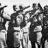 A historical photograph of the staff of the 2nd Battalion of the Gradnik Brigade, a Slovene partisan unit, showing leadership members in a wartime context.