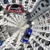 Volkswagen Golf cars are loaded in a delivery tower at the companies headquarter in Wolfsburg, March14, 2017. VW Golfs in einem Auslieferungsturm in W