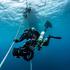 A diver from Finland takes part in a recovery operation for last two bodies of Italian scuba divers near Vaavu Atoll