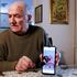 Marijan Janzikovic shows the picture of his late wife