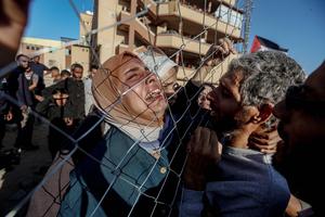 Palestinians released by Israel under the first phase of the ceasefire agreement arrive at Nasser Hospital