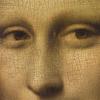 This famous detail of the *Mona Lisa*, painted by Leonardo da Vinci, highlights the enigmatic eyes of the subject. The portrait, housed in the Louvre, is renowned for its intricate rendering and the mysterious expression of the sitter, which has intrigued