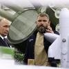 Russian President Vladimir Putin tours the exhibition "Everything for Victory" organised by People's Front, in Moscow