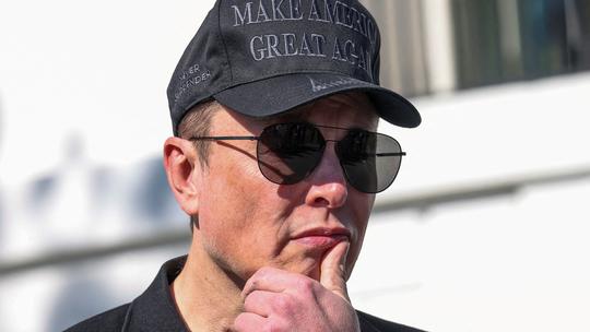 FILE PHOTO: Elon Musk is pictured at the White House in Washington