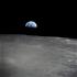 Earthrise - the crescent earth rising above the limb of the moon